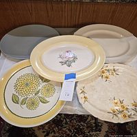 All five platters showing fronts and patterns
