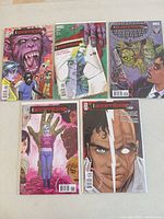 Front covers of all five iZombie comic issues bagged and boarded