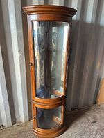 Full view of corner curio cabinet front