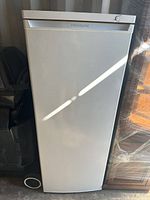 Front view of Frigidaire upright freezer