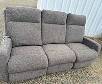 Front view of 3-seat gray/beige reclining sofa