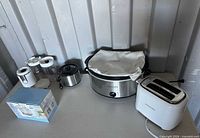 All four appliances arranged on table