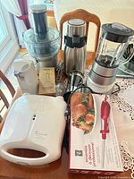Group shot of all appliances and tools on table