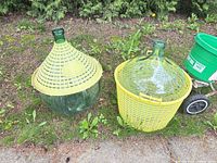 Both carboys side by side showing baskets and lid