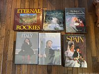 Top view of all six hardcover books laid on floor