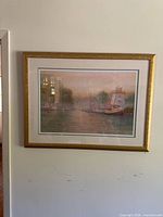Framed marina print on wall