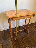 Front view showing full table and height measurement