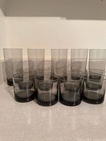 Front view showing all 13 smoked tumblers