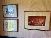 All three framed prints on wall