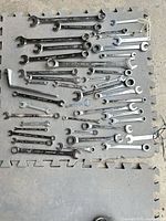 Wrenches laid out showing variety and sizes