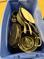 Overall view of cookware inside blue tote