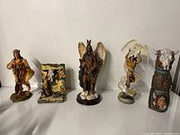 Group shot of all five figurines