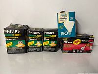 Front view of all boxes showing Philips EarthLight R40 and R30, ExtraLife 150W and Philips Halogen packaging