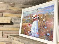 Front view of framed canvas print on mantle