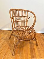 Three-quarter view of rattan chair