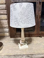 Front view of table lamp showing base and shade