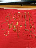 Entire lot of mixed metal costume jewelry displayed