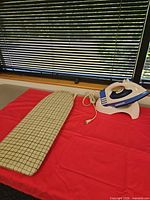 Iron, cradle, and sleeve board overall view