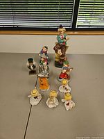 Group shot displaying all nine figurines