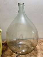 full view of clear glass demijohn front