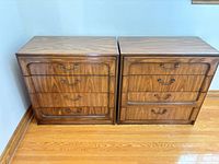 front view of both matching four-drawer dressers
