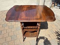 Top view showing carved walnut surface and handle rail