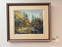 Full view of framed painting on wall