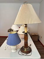Both lamps on tabletop showing sizes, bases and shades