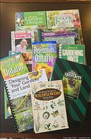 Group shot of all ten gardening books spread out on table