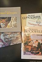 Group shot of all five art books