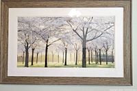 Full view of framed cherry blossom print showing frame, mat, and artwork