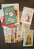 Overhead view of all 13 books spread out