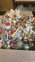 Overview of full box of assorted ornaments