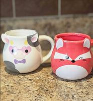 Cow and fox novelty mugs