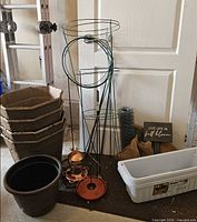 overview of plant supports, pots, feeders, planters