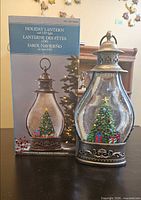 Lantern next to retail box showing product image and labeling