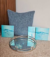 Group shot showing pillow, three plaques, mirrored tray with gems