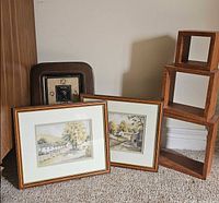 Clock, two framed prints, three cube shelves grouped