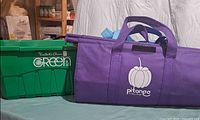 Purple Pitango bag beside President's Choice Green Box