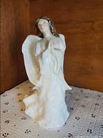 Front view of Royal Doulton Christmas Angel figurine