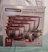 Front of original retail box showing Tramontina 14-piece stainless steel mixing bowl set with images of bowls and lids