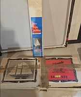 Both boxed model kits standing and lying flat