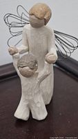 Front view of Willow Tree Guardian Angel figurine showing angel and child