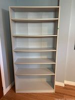 Front view of entire bookshelf showing overall structure and six shelves
