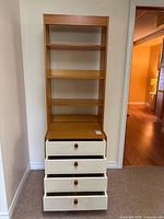 Full view of shelving unit with drawers open