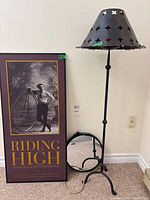 Group shot showing poster, candle stand with shade, mirror
