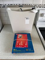 Shredder with photo paper packs bundled in front