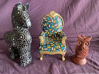 Front view of horse, chair and owl showing design and relative sizes