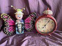 Clock and butterfly block front view