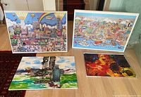 Overview of all four wall art pieces laid on floor